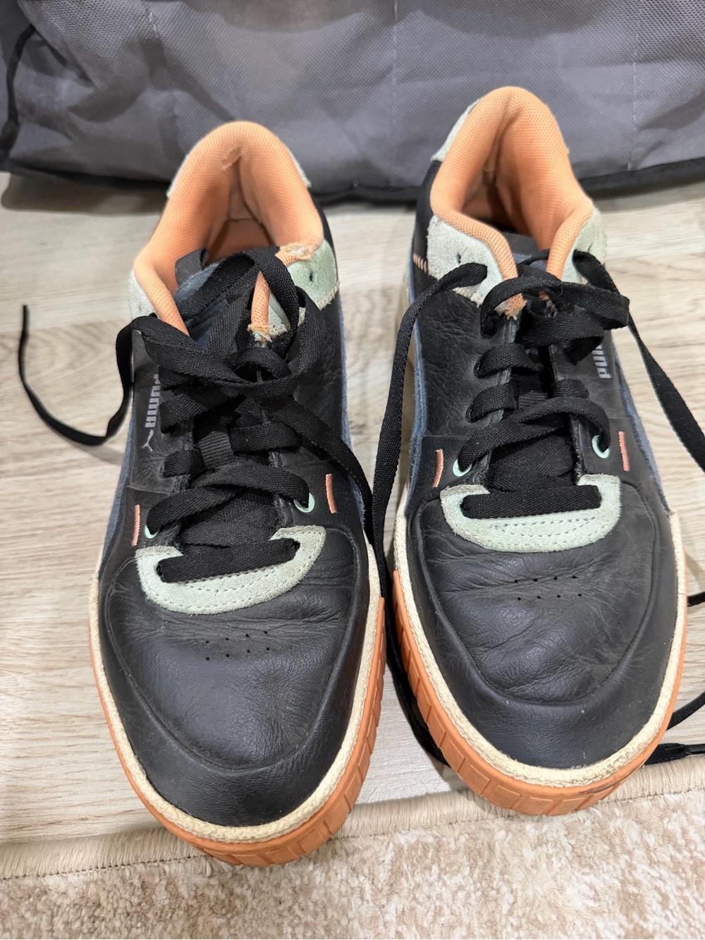 Puma Women's Black Sneakers with Orange and Mint Accents